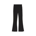 HER HIGH-WAIST FLARED LEGGINGS. 