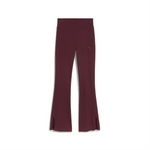 HER HIGH-WAIST FLARED LEGGINGS. 