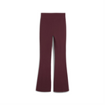 HER HIGH-WAIST FLARED LEGGINGS. 
